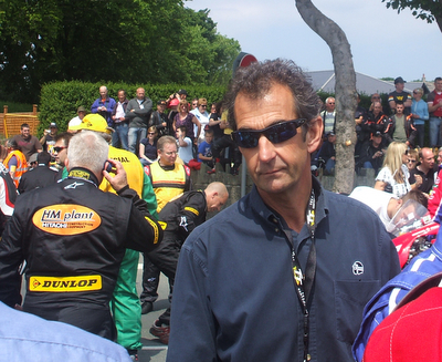 Steve Parrish, pictured at the Centenary TT, will help celebrate the event at the NEC